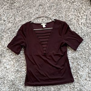 Woman’s Dark Maroon V neck Slim fitting revealing Cabernet wine colored blouse